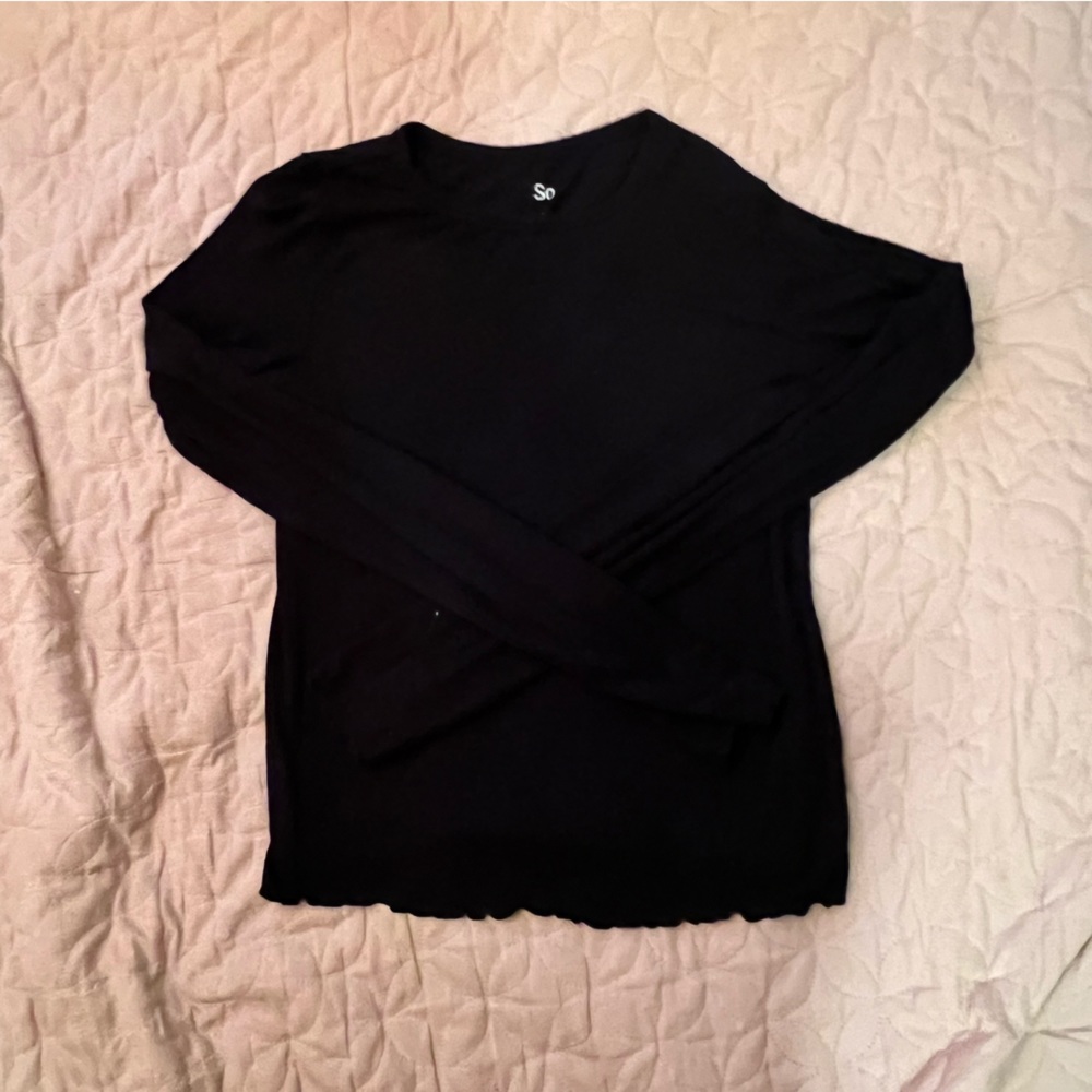 Black child’s small long sleeved top